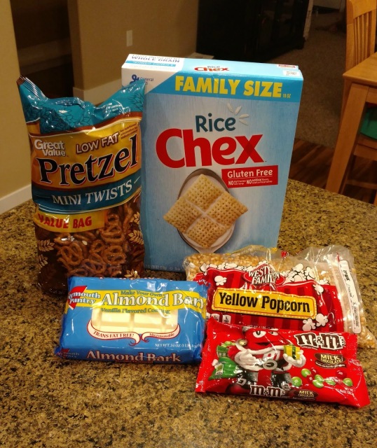 What do you get when you mix white chocolate, popcorn, pretzels, Chex mix and M&Ms together?  Pure deliciousness!